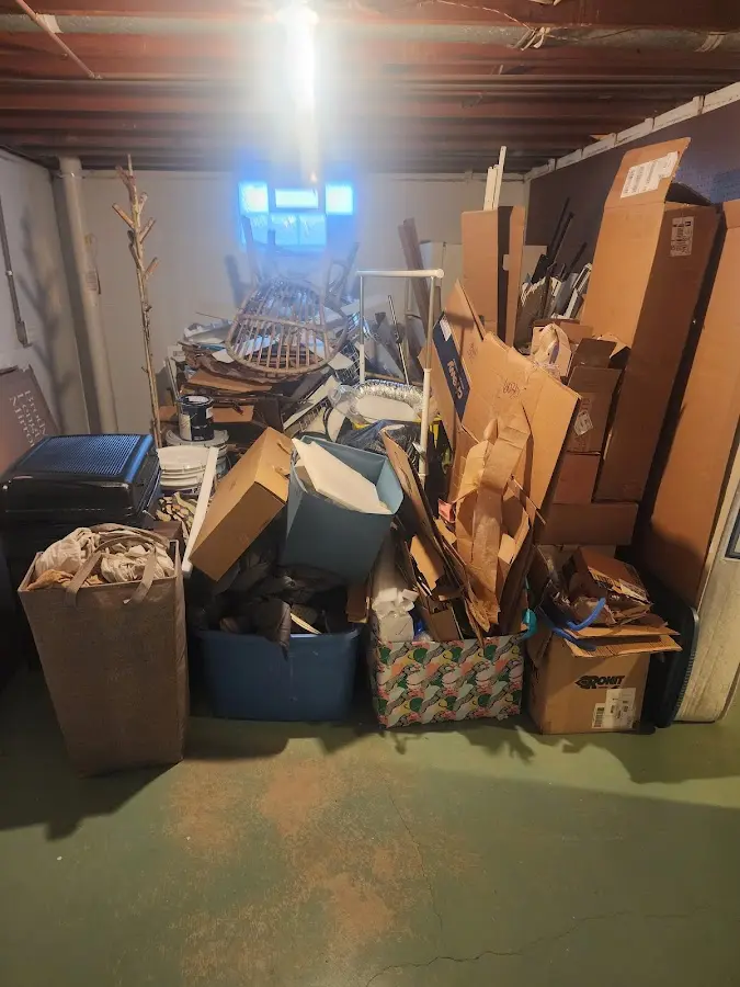 Roll-off dumpster container at job site for 4 Yard Dumpster Rental in Halawa